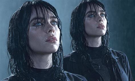 Billie Eilish Smolders As She Gazes Up Into A Downpour In Promo Snap For Her New Fragrance